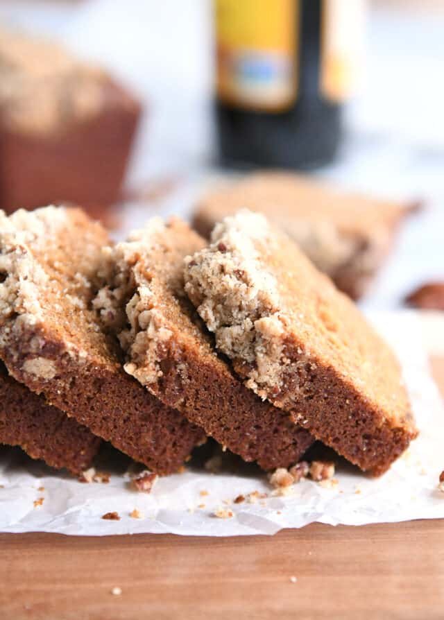 Three slices of gingerbread mini loaf with streusel.
