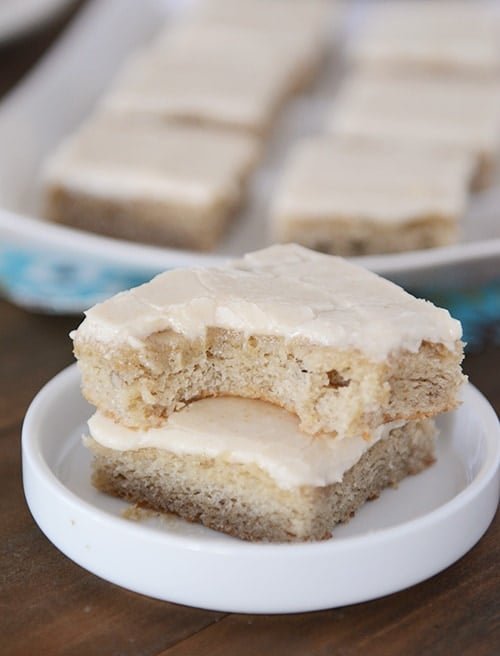 Two banana bars stacked on top of each other with a bite taken out of the top bar.